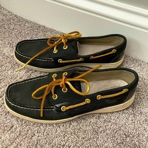 Like new black and gold sperrys!